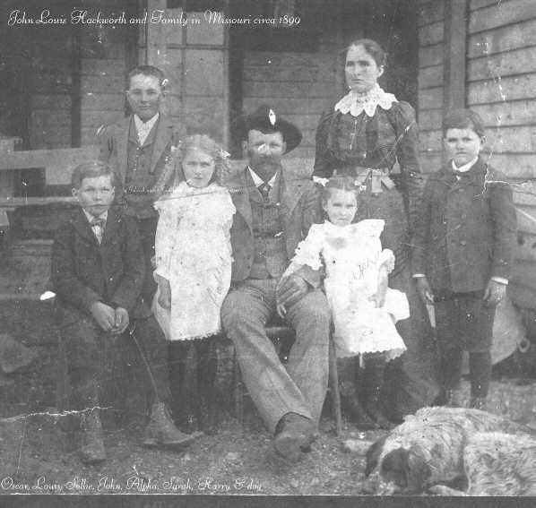 My grandfather at 13 yrs (tall left) with his father, John L. (seated)